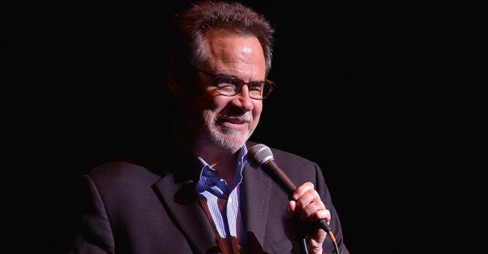Cum a ajuns Dennis Miller de la magazinul alimentar la Saturday Night Live