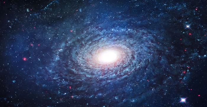 Cum creează gravitația „penele" galaxiilor spiralate precum cea a noastră?